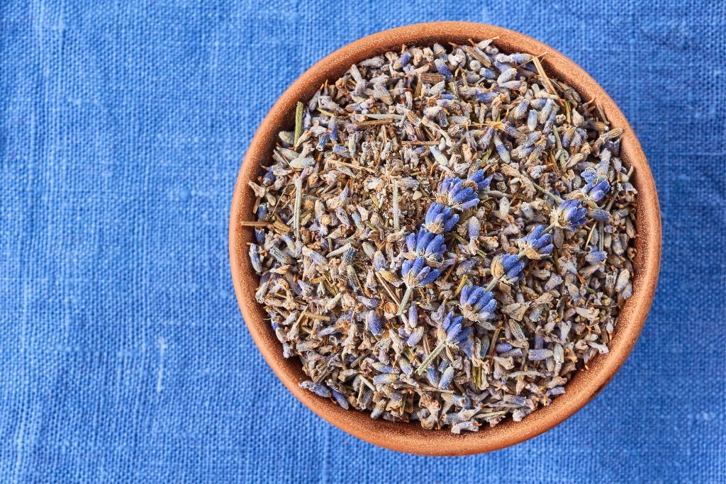 dried lavender on a table with blue cloth