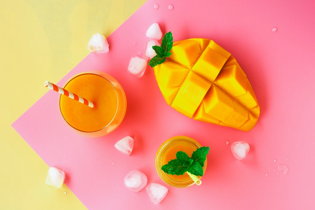 mango tea with a mango by its side