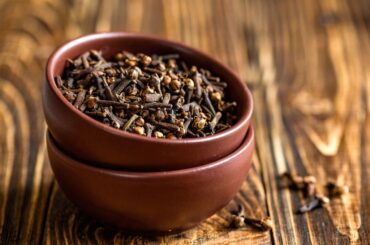 dried clove tea placed in a bowl