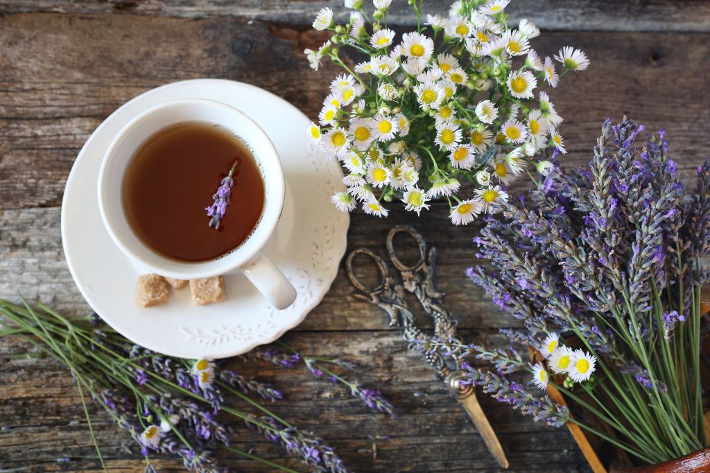 a blend of chamomile and lavender tea on a wooden background