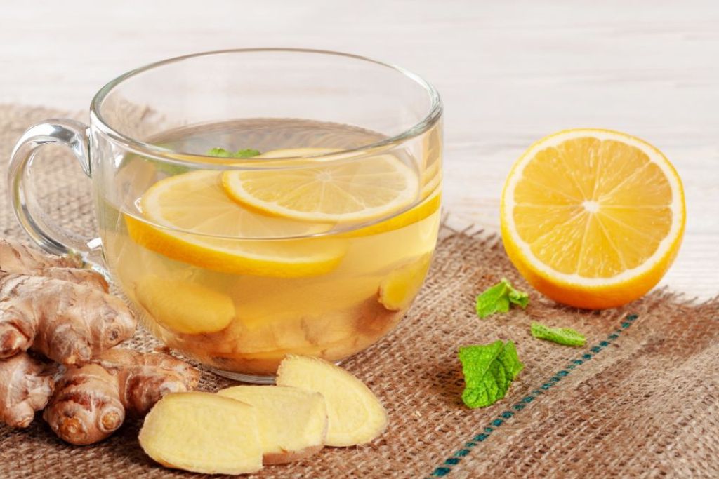 a cup of tea with ginger and lemon zest